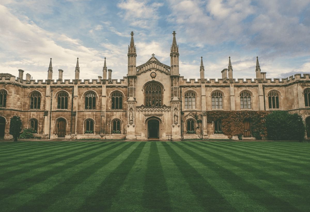 The lawn and Gothic front of a court at Corpus Christi College