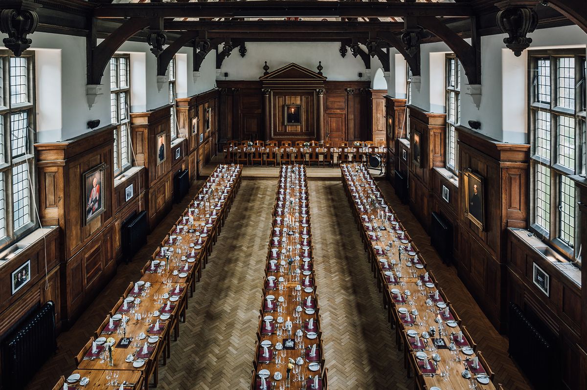 The Selwyn dining hall, its long tables set for a formal dinner