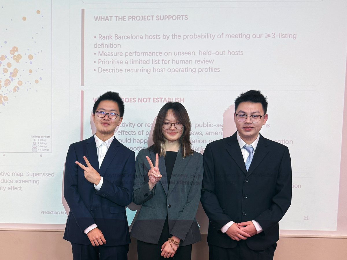 A team of three presents its project