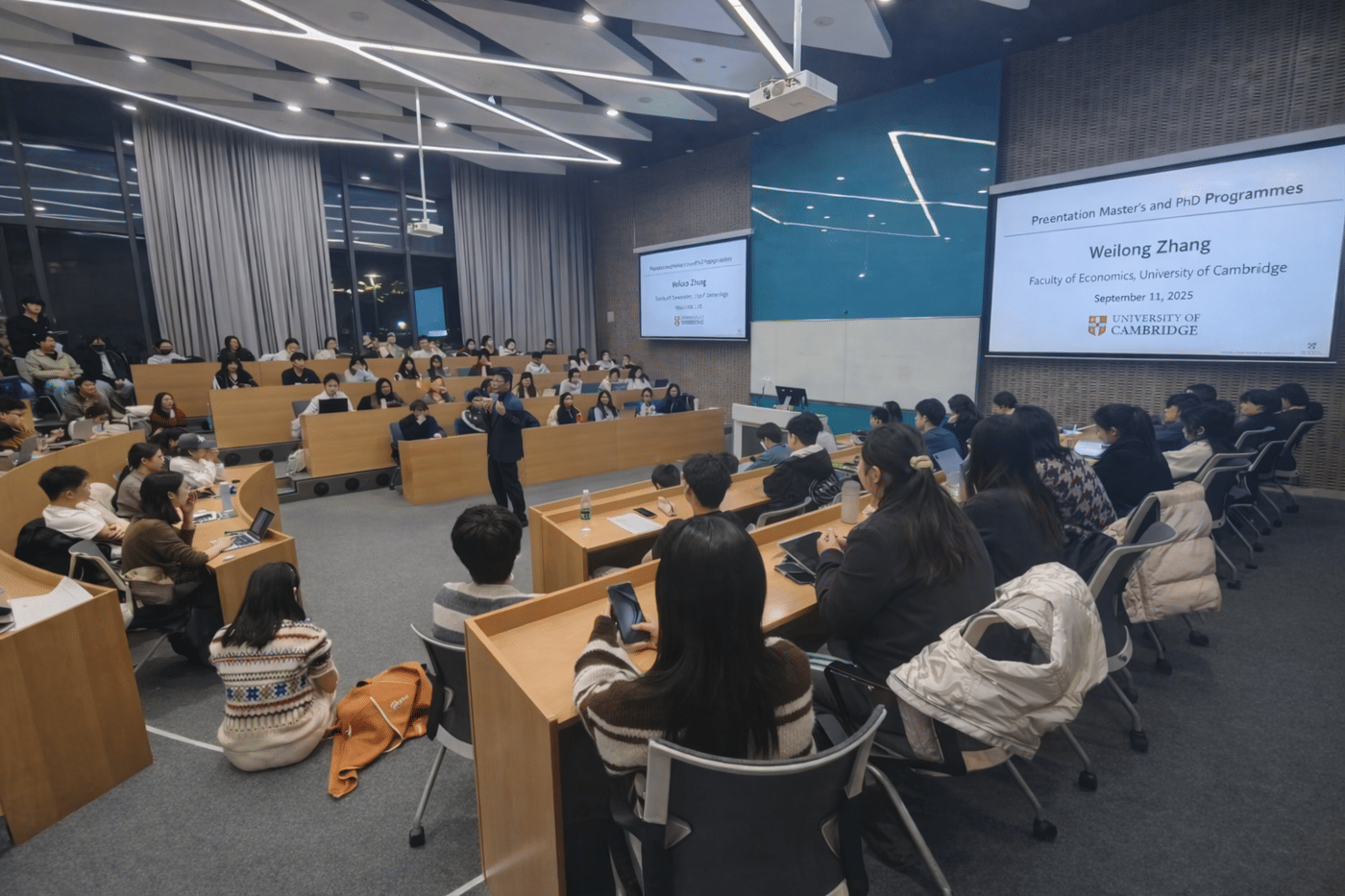 A talk on master’s and PhD programmes in a full lecture hall